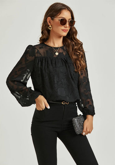 Top de encaje de tul flocado de manga larga en negro