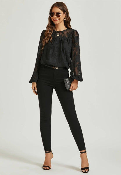 Top de encaje de tul flocado de manga larga en negro