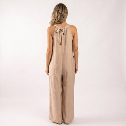 Mono pantalón fluido corte palazzo, espalda para anudar, bolsillos